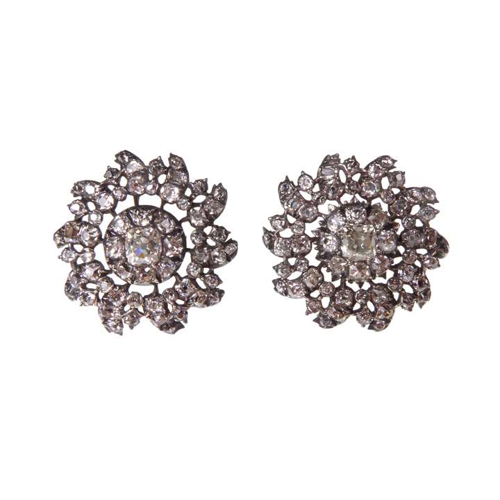 Pair of cushion cut diamond flower cluster earrings